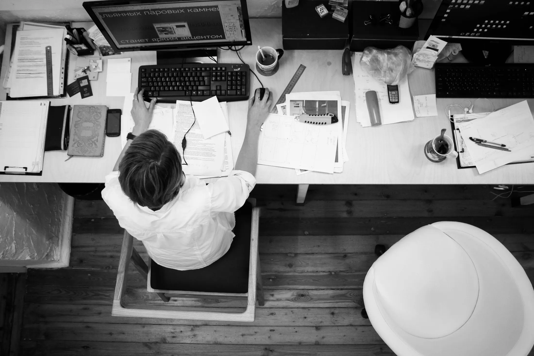 Desk with documents and spreadsheets
